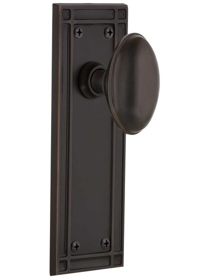 Mission Door Set with Oval Knobs in Timeless Bronze.